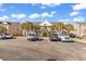 Ample parking available in front of charming residential buildings at 881 Palmetto Trail # 103, Myrtle Beach, SC 29577