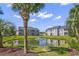 Community pond surrounded by lush landscaping in well maintained community at 881 Palmetto Trail # 103, Myrtle Beach, SC 29577