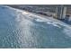 The aerial view highlights the oceanfront condos with sandy beach access and an ocean view at 912 N Waccamaw Dr. # 1404, Garden City Beach, SC 29576