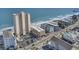 An aerial view shows the condos and buildings lining the beach, with ocean views from each property at 912 N Waccamaw Dr. # 1404, Garden City Beach, SC 29576