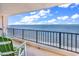 Balcony overlooking ocean featuring a green chair and table at 912 N Waccamaw Dr. # 1404, Garden City Beach, SC 29576