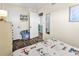 Comfortable bedroom with nautical themed bed, dresser, and small TV at 912 N Waccamaw Dr. # 1404, Garden City Beach, SC 29576