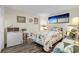Cozy bedroom with nautical-themed bedding, window view, and unique decor at 912 N Waccamaw Dr. # 1404, Garden City Beach, SC 29576