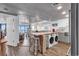 Open concept kitchen with bar seating and stainless steel appliances at 912 N Waccamaw Dr. # 1404, Garden City Beach, SC 29576