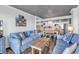 Inviting living room with comfortable seating, stylish decor, and an open floor plan to the dining area and kitchen at 912 N Waccamaw Dr. # 1404, Garden City Beach, SC 29576