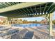 Community pool featuring chairs around the deck and a pergola for shaded seating at 9134 Abingdon Dr., Myrtle Beach, SC 29579