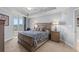 Bedroom showcasing a king bed, balcony access with golf course views and neutral walls at 9547 Edgerton Dr. # 301, Myrtle Beach, SC 29572
