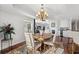 A dining room view towards the living room with a fireplace and a bar at 9547 Edgerton Dr. # 301, Myrtle Beach, SC 29572