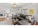 Bright, open living space with a fireplace and access to kitchen at 9547 Edgerton Dr. # 301, Myrtle Beach, SC 29572