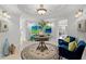 Beautiful lobby showcases a circular rug, comfortable seating, and tasteful artwork at 9547 Edgerton Dr. # 301, Myrtle Beach, SC 29572