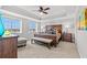 Main bedroom suite featuring coffered ceilings, furniture and bright windows at 9547 Edgerton Dr. # 301, Myrtle Beach, SC 29572