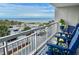 Balcony with outdoor seating and a beautiful ocean view, perfect for relaxing and enjoying the scenery at 9820 Queensway Blvd. # 303, Myrtle Beach, SC 29572