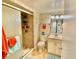Compact bathroom includes shower, vanity, and colorful accents at 9820 Queensway Blvd. # 303, Myrtle Beach, SC 29572