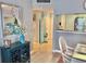 Dining area with a glimpse of the kitchen and hallway at 9820 Queensway Blvd. # 303, Myrtle Beach, SC 29572