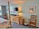 Relaxing main bedroom featuring soft lighting, a comfortable bed, and calming color tones for a peaceful retreat at 9820 Queensway Blvd. # 303, Myrtle Beach, SC 29572