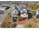 Aerial view of house with palm trees and a circular driveway at 102-A N Poplar Dr., Surfside Beach, SC 29575