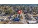 Aerial view showcasing the house's location in a residential neighborhood at 102-A N Poplar Dr., Surfside Beach, SC 29575