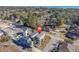 An aerial view showcasing the home's location within a neighborhood with proximity to local amenities at 102-A N Poplar Dr., Surfside Beach, SC 29575