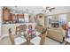Open-concept living room with modern furnishings and a view of the breakfast bar and kitchen at 102-A N Poplar Dr., Surfside Beach, SC 29575