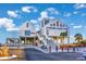 Surfside Beach Pier entrance featuring two buildings and a long staircase at 102-A N Poplar Dr., Surfside Beach, SC 29575