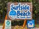 Surfside Beach sign that says 'The Gathering Beach' at 102-A N Poplar Dr., Surfside Beach, SC 29575