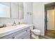Bathroom featuring a vanity with storage and a glass shelf at 10301 N Kings Hwy. # 15-8, Myrtle Beach, SC 29572