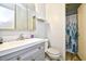 Updated bathroom with new vanity and shower with blue tree curtain at 10301 N Kings Hwy. # 15-8, Myrtle Beach, SC 29572