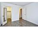 Bright bedroom with wood-look floors and ample closet space at 10301 N Kings Hwy. # 15-8, Myrtle Beach, SC 29572