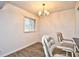 Dining area with wood flooring and chandelier at 10301 N Kings Hwy. # 15-8, Myrtle Beach, SC 29572