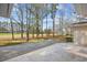 Backyard features a patio, trees, and view of the golf course at 1043 Yellow Jasmine Dr., Longs, SC 29568