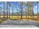An expansive backyard with a view of the golf course provides ample space for outdoor activities and relaxation at 1043 Yellow Jasmine Dr., Longs, SC 29568