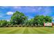 The Long Bay Club entrance with brick wall and manicured lawn at 1043 Yellow Jasmine Dr., Longs, SC 29568