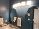 A bathroom featuring custom mirrors, elegant lighting, and a sleek vanity at 1101 Louise Costin Ln. # 1308, Murrells Inlet, SC 29576
