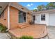 Back patio with seating area, accessible from the house at 115 Carolina Ave., Mullins, SC 29574