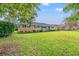 Charming brick ranch home with a well-maintained lawn and landscaping at 115 Carolina Ave., Mullins, SC 29574