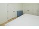 Stylish bedroom featuring light floors, a blue cabinet and white closets at 1211-B N Waccamaw Dr., Garden City Beach, SC 29576