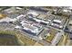 Aerial view of shopping center featuring a mix of retail, dining, entertainment, and parking areas at 1411 Powhaton Dr., Myrtle Beach, SC 29577