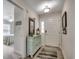 Inviting home foyer with stylish decor, a decorative cabinet, and a view into the adjacent bedroom at 1411 Powhaton Dr., Myrtle Beach, SC 29577