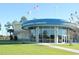 Exterior view of Crabtree Memorial Gymnasium surrounded by a well-maintained lawn and sidewalks at 1411 Powhaton Dr., Myrtle Beach, SC 29577