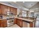 Beautiful kitchen with stainless steel appliances and decorative backsplash at 1411 Powhaton Dr., Myrtle Beach, SC 29577
