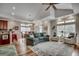 Spacious living room with open floor plan to dining area and hardwood floors at 1411 Powhaton Dr., Myrtle Beach, SC 29577