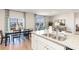 Open-concept kitchen with granite counters, stainless steel appliances, and scenic views of the lake at 1450 Nokota Dr., Conway, SC 29526