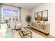 Cozy living room with a comfortable sofa, stylish decor, and scenic lake views at 1450 Nokota Dr., Conway, SC 29526