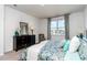 Comfortable bedroom features plush carpeting, neutral walls, large windows, and lake views at 1450 Nokota Dr., Conway, SC 29526