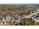 An aerial view of a home in a beautiful, quiet neighborhood with mature trees and landscaping at 159 Terracina Circle, Myrtle Beach, SC 29588