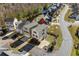 Aerial view of a two-story home located on a lot beside a waterway at 159 Terracina Circle, Myrtle Beach, SC 29588