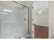 This bathroom features a glass enclosed walk-in shower with view to the bedroom at 159 Terracina Circle, Myrtle Beach, SC 29588