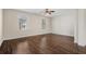 Light-filled bedroom featuring hardwood floors, neutral paint and great natural light at 159 Terracina Circle, Myrtle Beach, SC 29588