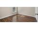This bedroom features wood-look floors, neutral walls, and a window at 159 Terracina Circle, Myrtle Beach, SC 29588