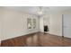 Bedroom with hardwood floors, natural light, a ceiling fan, and a connecting bathroom at 159 Terracina Circle, Myrtle Beach, SC 29588